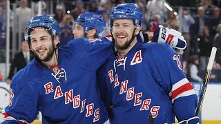 New York Rangers Derek Stepan celebrates with teammates after scoring the  game winning goal in overtime against the Washington Capitals in game 7 in  the second round of the Stanley Cup Playoffs