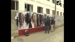 'Wall of Kindness' helps people to brave chilling cold in India's northern Srinagar city