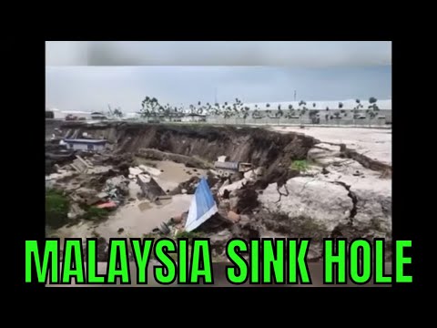 Malaysia GIANT SINK HOLE Swallows Homes