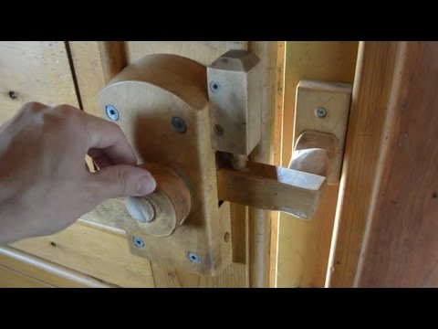 Wooden door latches at Amogla camp - YouTube