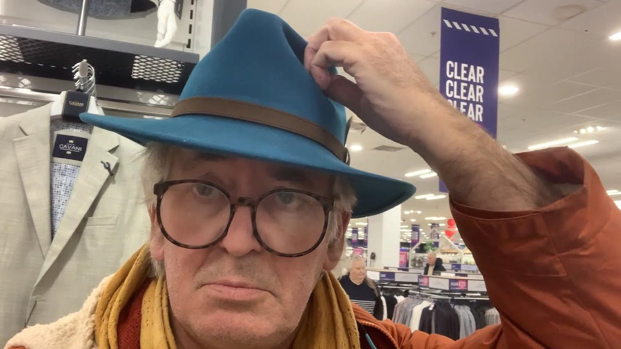 Shanks shops sharp suits (a critique of consumer culture)