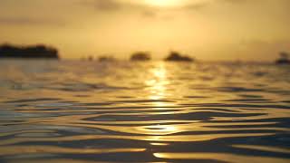 Reflections of light in sea waves mind relaxing 4k video.. screenshot 1