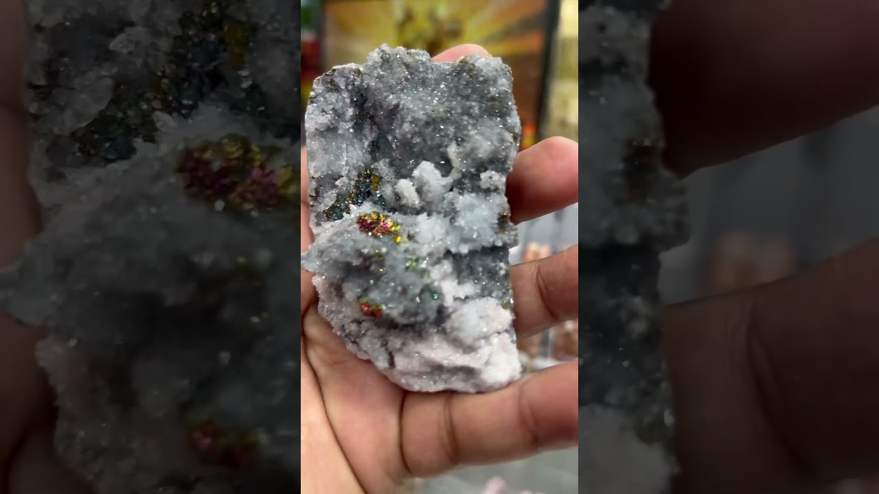 Calcite with Rainbow Pyrite cluster.