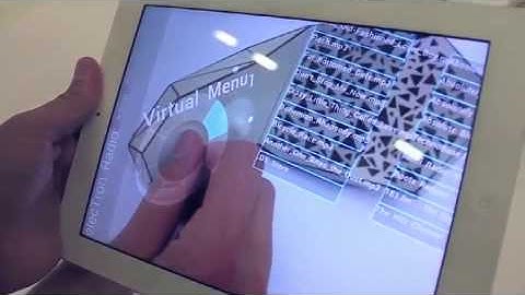 Smarter objects: using AR technology to program physical objects and their interactions