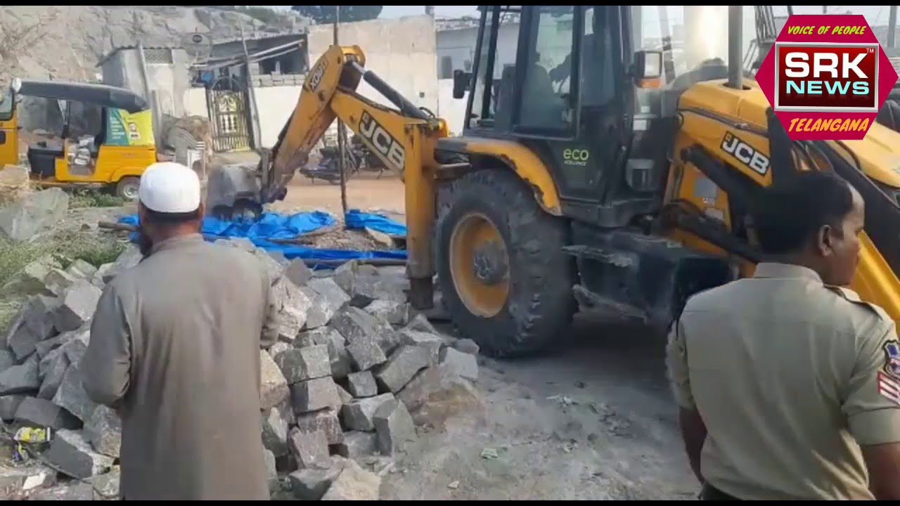 REVENUE OFFICIALS DEMOLITION ILLEGAL CONSTRUCTIONS IN GOVT LAND AT GAJULARAMARAM 125 DIVISION