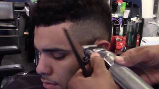 Mohawk bald fade haircut with part