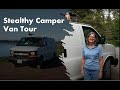 Van Life tour: Stealthy Chevy Van conversion for retired couple.