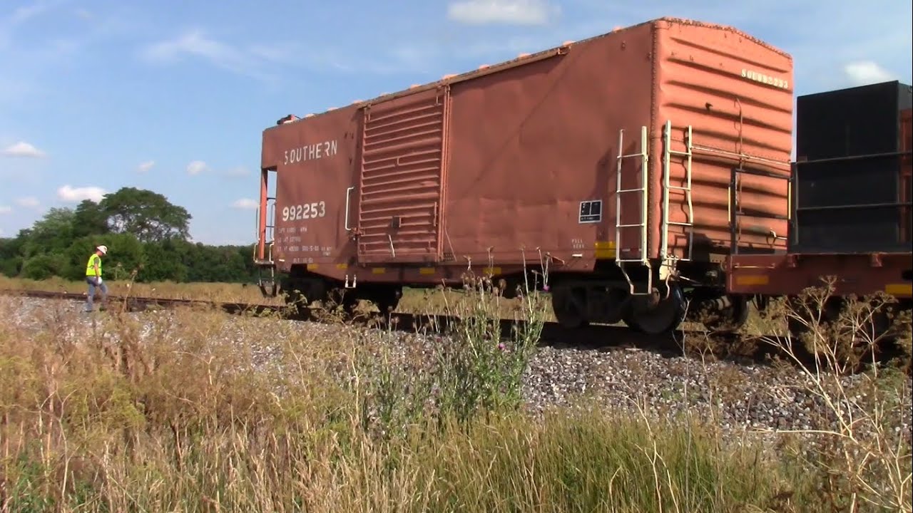 NS Ballast Cleaner Train Moving off of an Industry Track near West