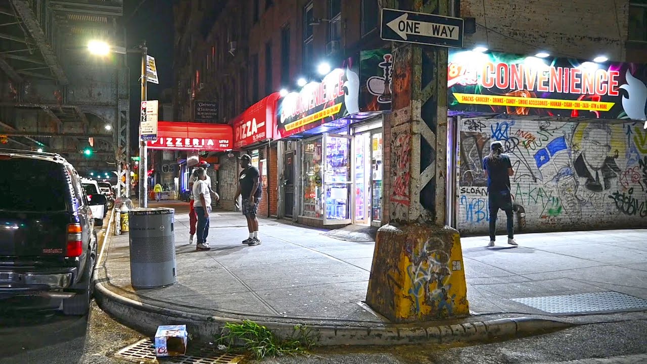 Walking on Broadway under the subway tracks in Brooklyn, Williamsburg