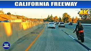 Motorcyclist calmly driving one hand at 100mph(160km/h) speed along California Freeway (I-5) | 4k