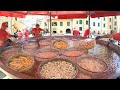 Cooking 3 Tons of Fish in a Mammoth Pan. Street Food in Camogli, Italy