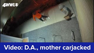 Security camera footage of DA Williams and mother carjacked by armed suspects