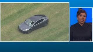 Tesla driver hits pedestrian in Clinton