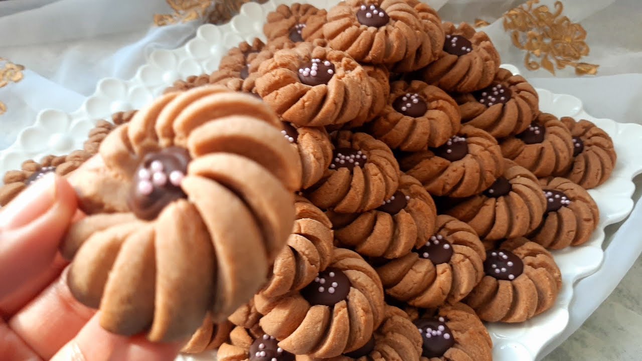 حلوة طابع الوردة بنكهة القهوة لدواز اتاي يعجبك مذاقها وتاتخرج بزوج بيضات تبارك الله 80 حبة