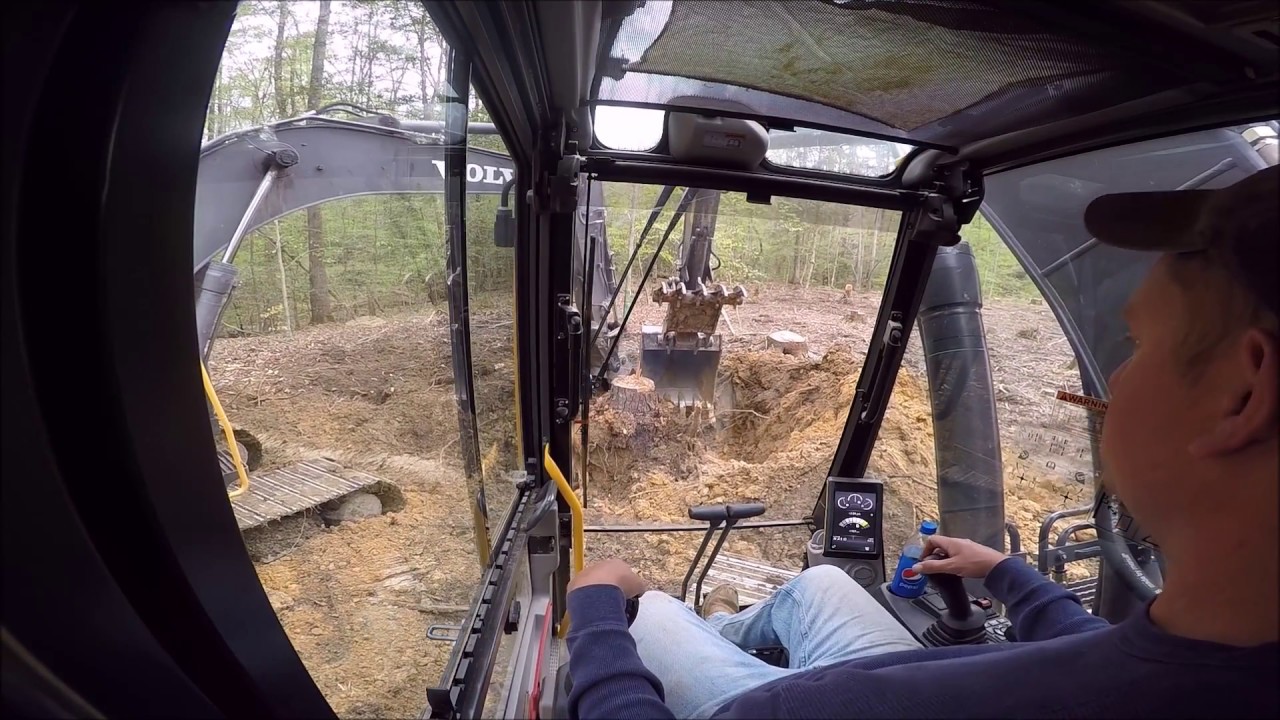 Excavators Pulling Out Stumps