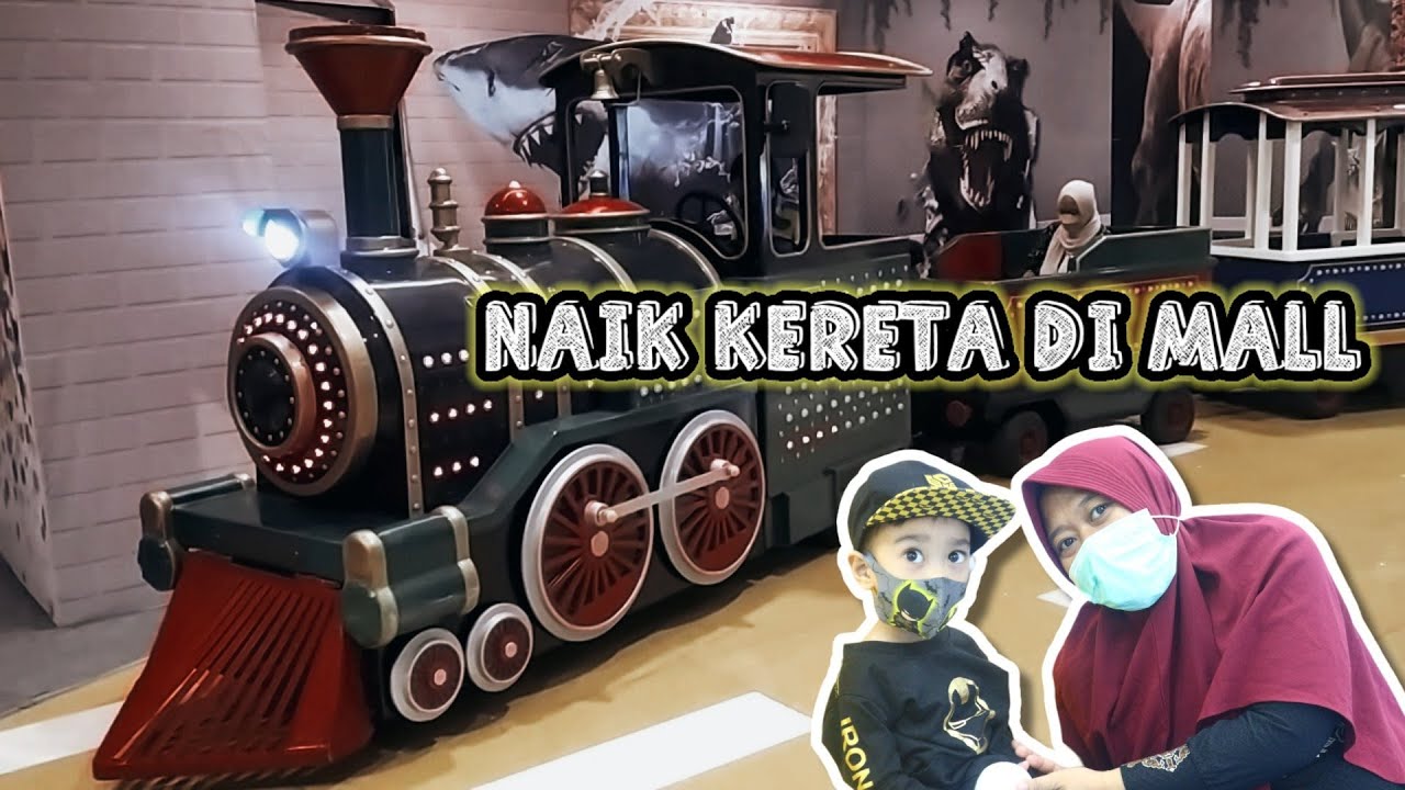 naik kereta api di mall grand city surabaya