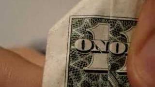 Reptilian face on one dollar bill !!!