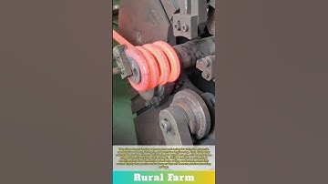 Forging a heavy steel coil spring by heating and coiling: manufacturing train shock springs factory