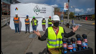 Mock press conference pokes fun at Port of Tacoma's reliance on fossil fuel facilities