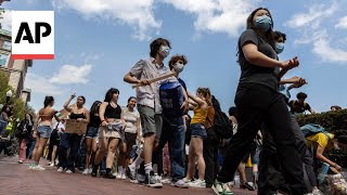 Pro-Palestinian protesters defy Columbia University's deadline to disband camp or face suspension