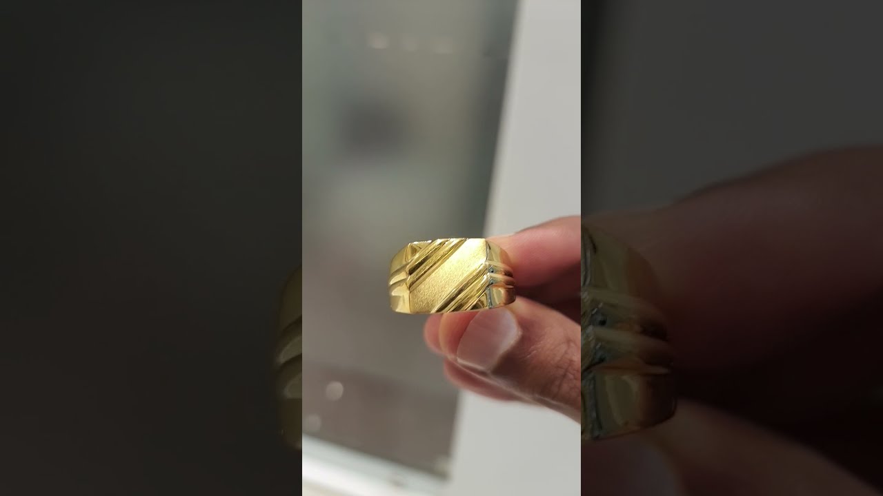 Sold at Auction: Gold Tone Man's Ring Size 11