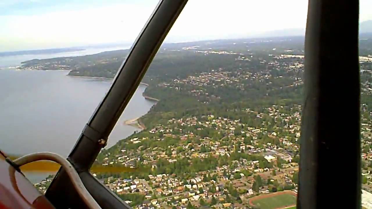 Flight in 1940 WACO UPF-7 biplane over Seattle, WA