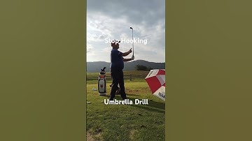 How To Stop Hooking the Golf Ball!Umbrella Drill! #shorts