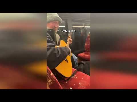 True meaning of bus-ker: Edinburgh man delights passengers on 35 bus with musical interlude