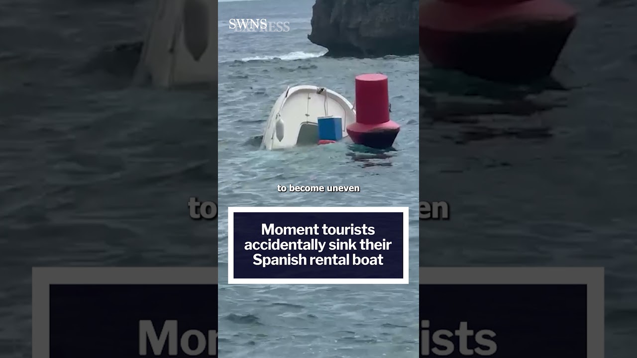 Moment tourists accidentally sink their Spanish rental boat