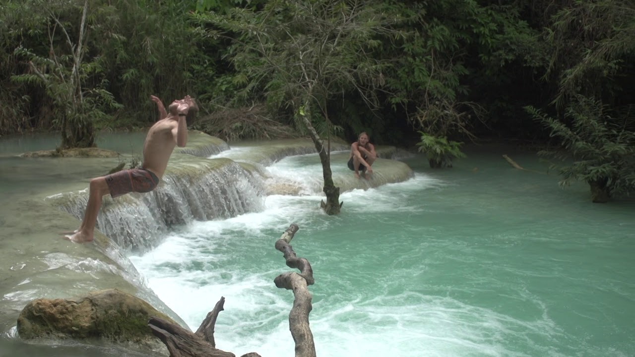 Tourist Jumping into SECRET POOL Kuang Si Falls Luang Prabang Laos Travel Places to Visit