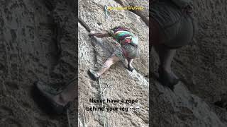 Never have a rope behind your leg!If you fall flip you upside down,putting you at risk,head injury