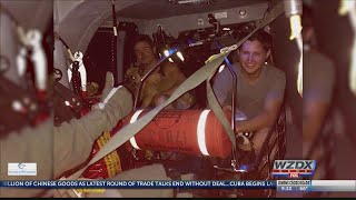 Mississippi Coast Guard rescues 2 men, 3 dogs from flood waters