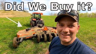 Tractor Mowing Heavy Brush On a Slope With A Heavy Duty Rotary Cutter