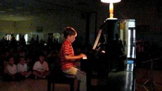 Second grader at the talent show
