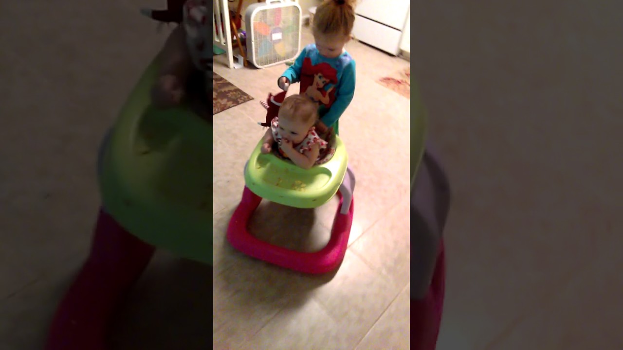 Getting a ride on the babies walker YouTube