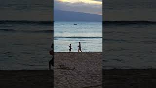 Giovanni and the kids having fun on Kaanapali Beach during a Maui Sunset