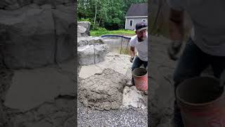 Concrete hand bomb application and techniques for artificial rock carving.