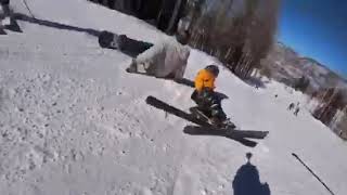Snowboarder collides into kid on skis while going down the mountain