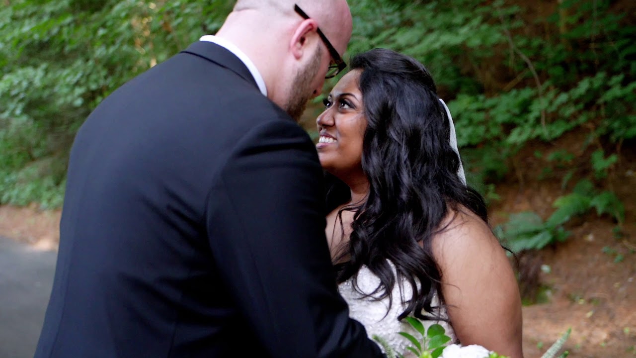 A Newlywed Couple Poses Near The Sea - Stock Video | Motion Array