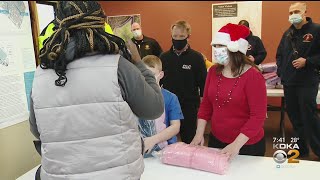 Firefighters Provide Children With New Winter Coats