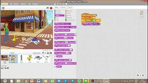 Cara membuat animasi scratch menggunakan Looks, Variable, dan Control.