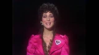 Cher!     Recites Rudyard Kipling's \