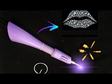      الة تثبيت الكريستال على الملابس