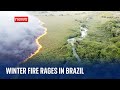 Brazil: Firefighters battle raging wildfires in winter heatwave