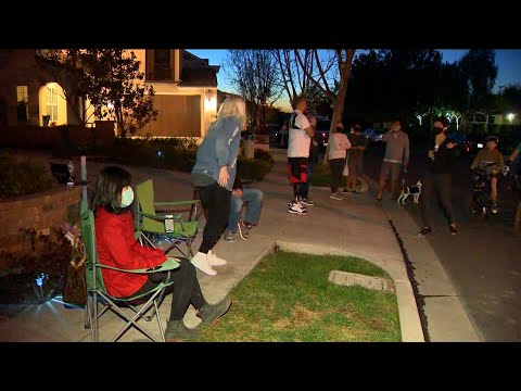 Neighbors of Harassed Asian Family Take Turns Standing Guard