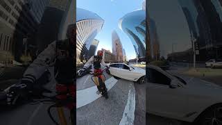 Inattentive Driver Almost Collided With a Scooter Rider