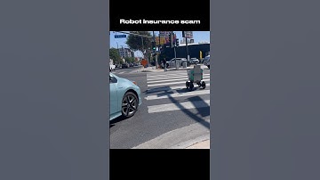 ROBOT SCAM: Food Delivery Robot Attempts To Get Hit By Car #robotics #automation #ai #deliveryrobot