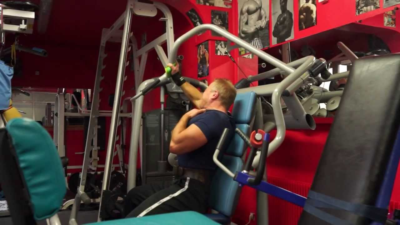 Michael Gundill performs upper chest supersets on a Technogym incline