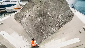 Long Video Of Decompression During Phosphate Ore Unloading On A Ship: A Daily Work Record