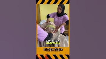 proses memakai gaun pengantin besar yang anggun